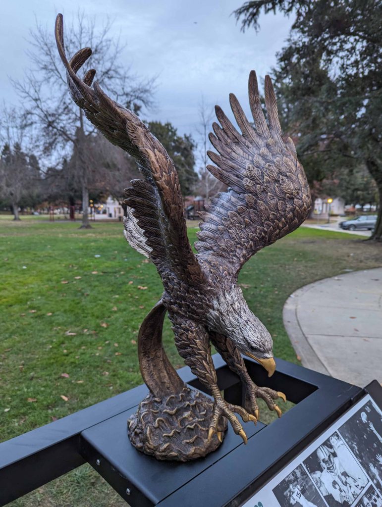 Bronze sculpture of an eagle landing, mounted to the top of the new monument at Eagle Park in Mountain View.